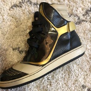 Ladies adidas black and gold high tops